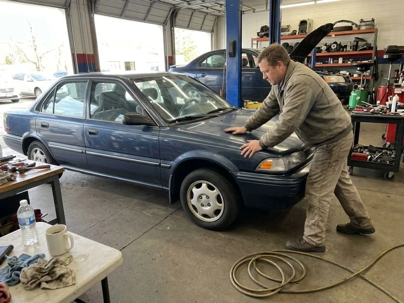 Car being bounce-tested for strut condition