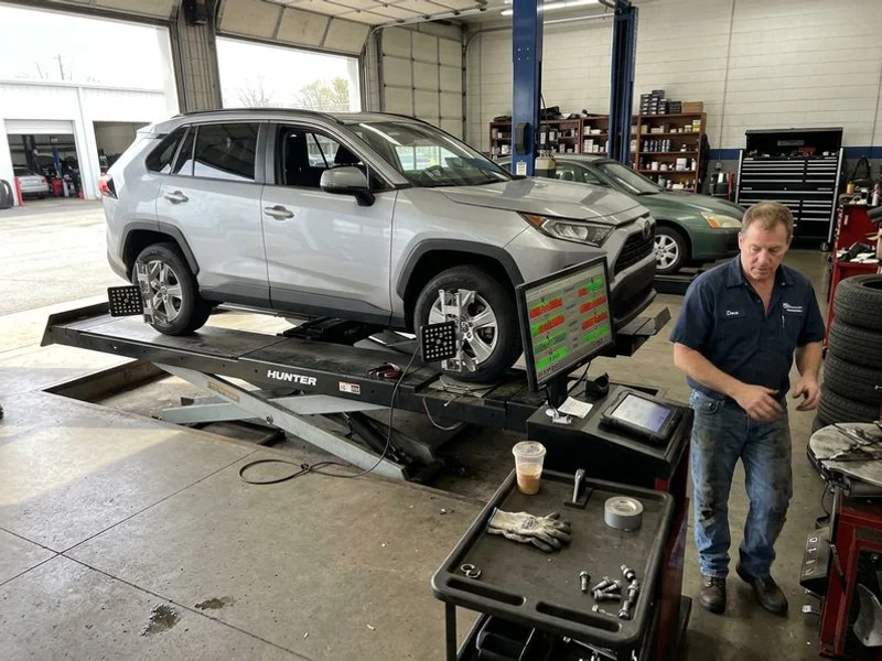 Hunter alignment rack with laser targets attached to wheels