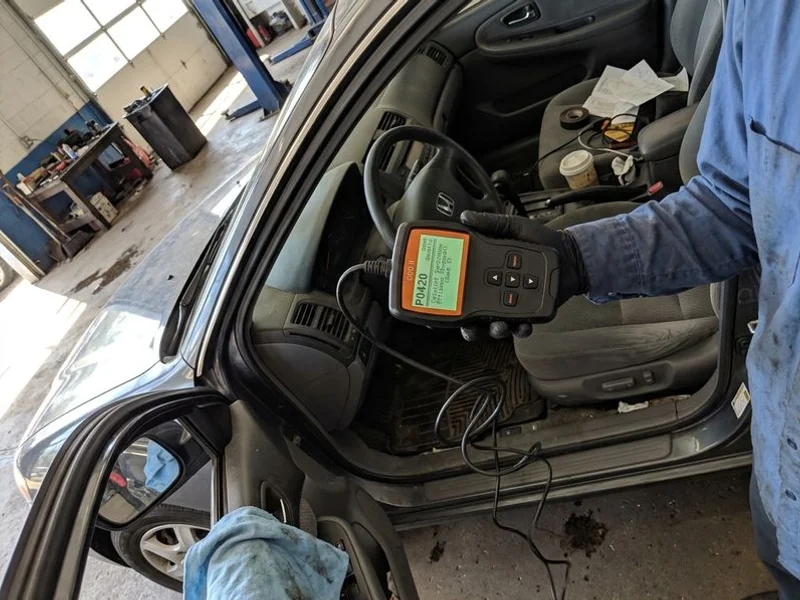 OBD-II scan showing catalyst efficiency trouble code